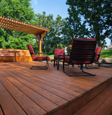 wood deck with table and 4 chairs with mosquito control-Pest Control Services in Covington GA